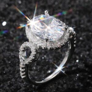 🔥Beautiful Hollow Oval Pure Zircon Cubic Carved Macro Pave Silver Rings, K812